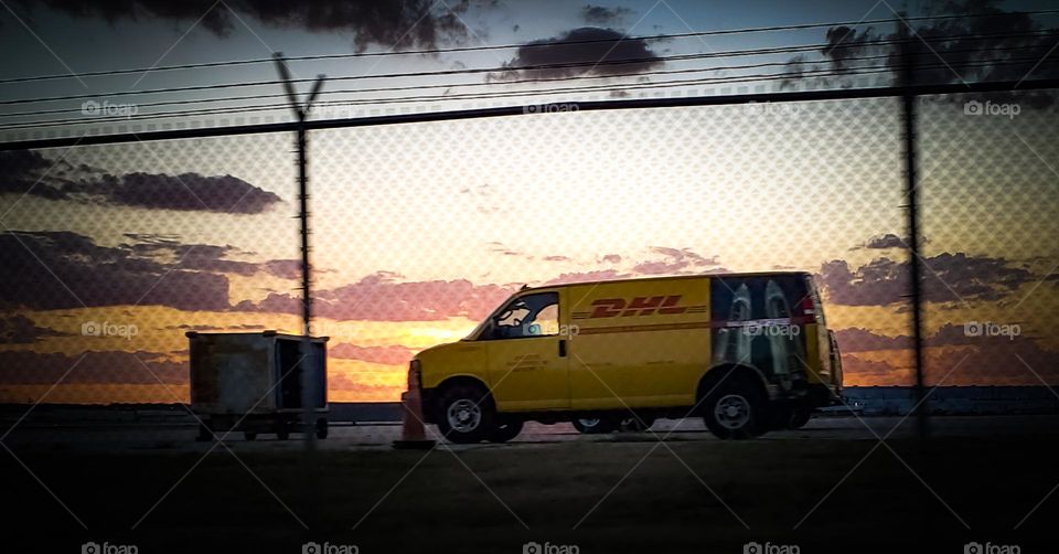 DHL van at sunset (Facebook ad size)