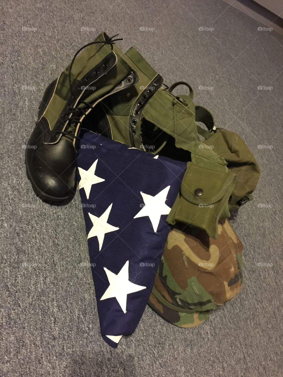 Closeup of military uniform and shoe with american flag