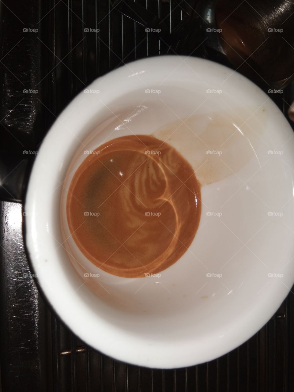 shot of Espresso on a white cup
