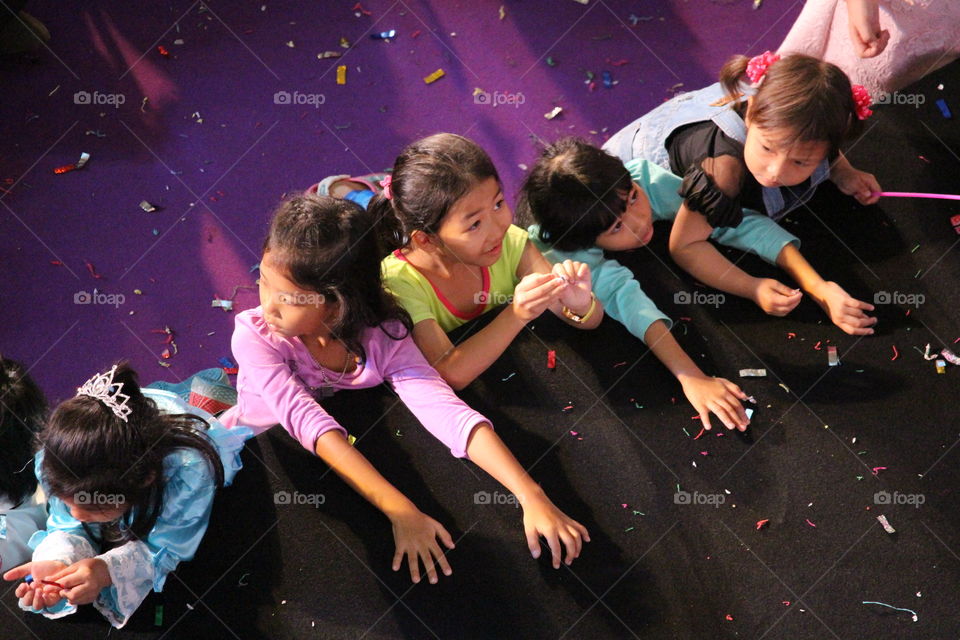 Captivated children at Children's Day Central mall Bangkok