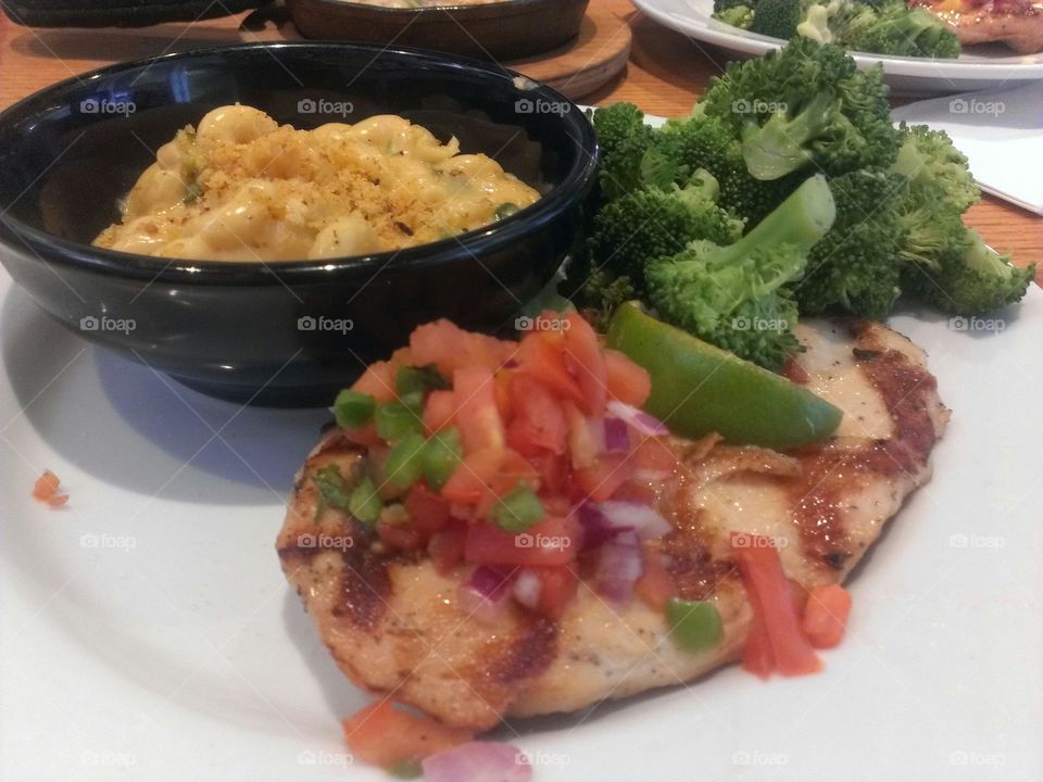 Margarita Chicken Dish. Margarita chicken with broccoli and macaroni and cheese.