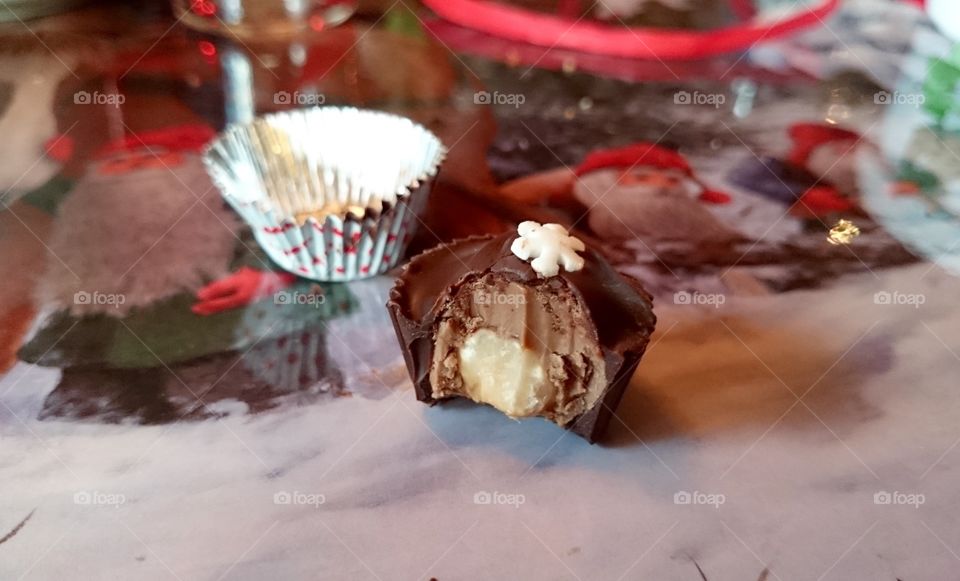 Taking a bite of homemade chocolate praline