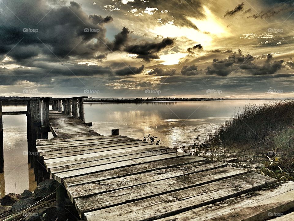 Sunset on river jetty