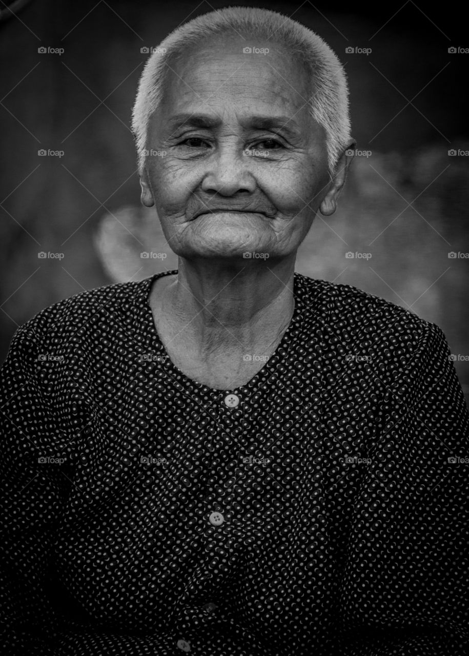 Shy smile in black and white