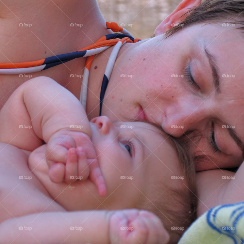 On the beach . Mother and dother 