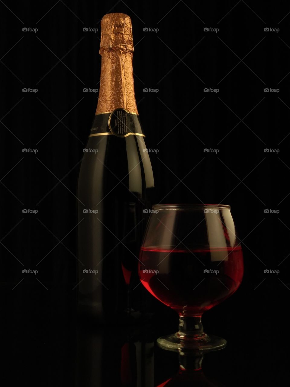 Champagne / wine bottle and glass