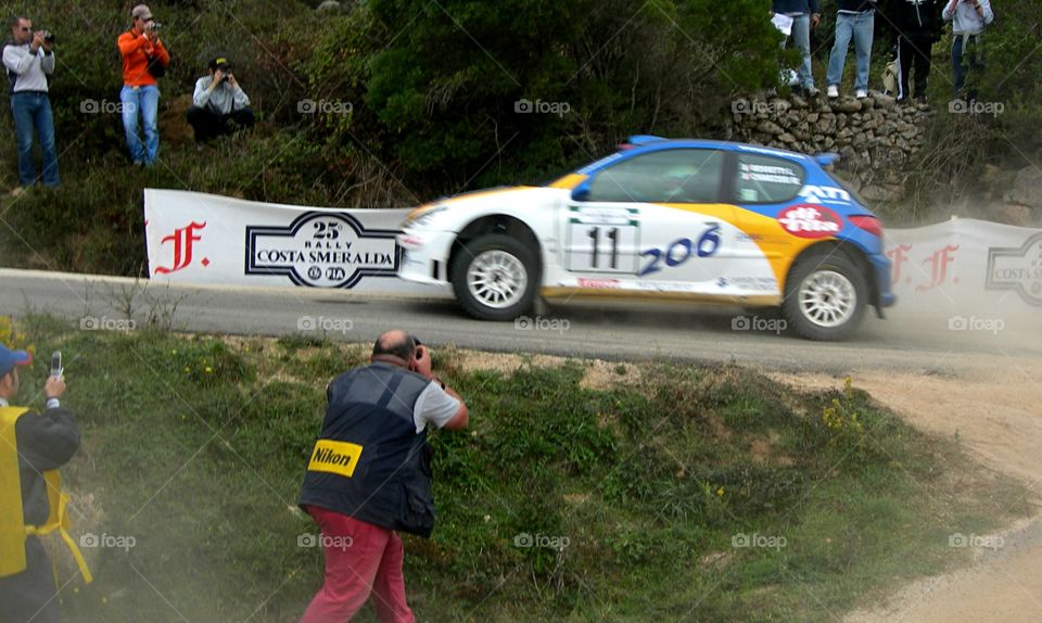 photographeurs in action in a rally competition