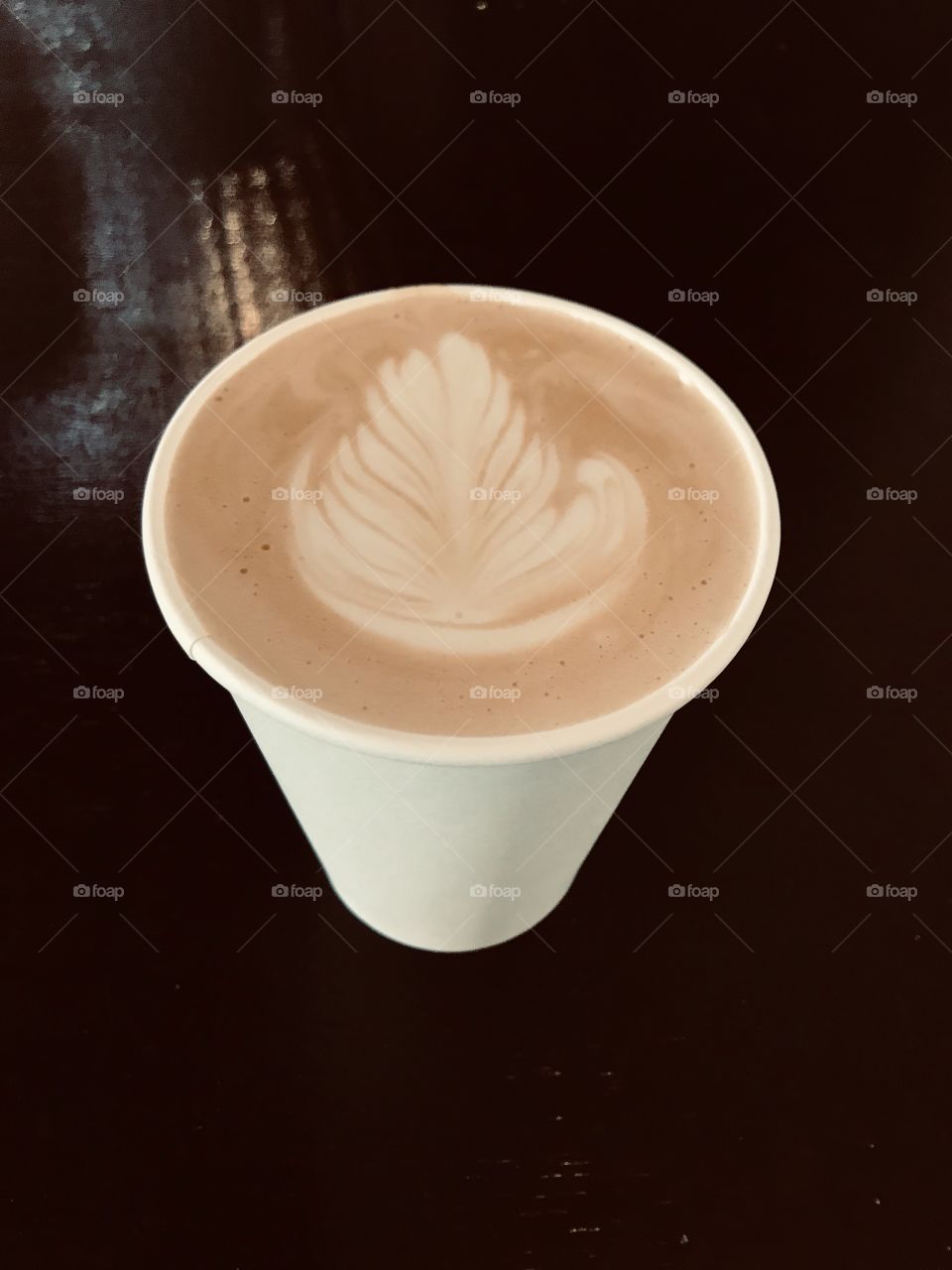 Latte art on dark background 