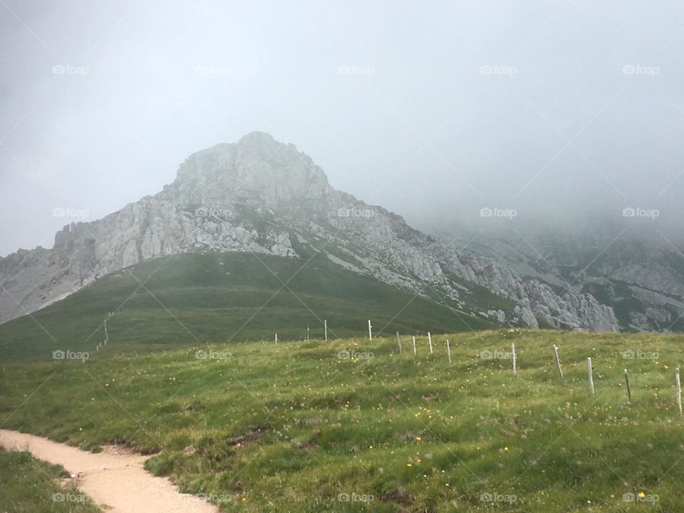 a foggy day in dolomites