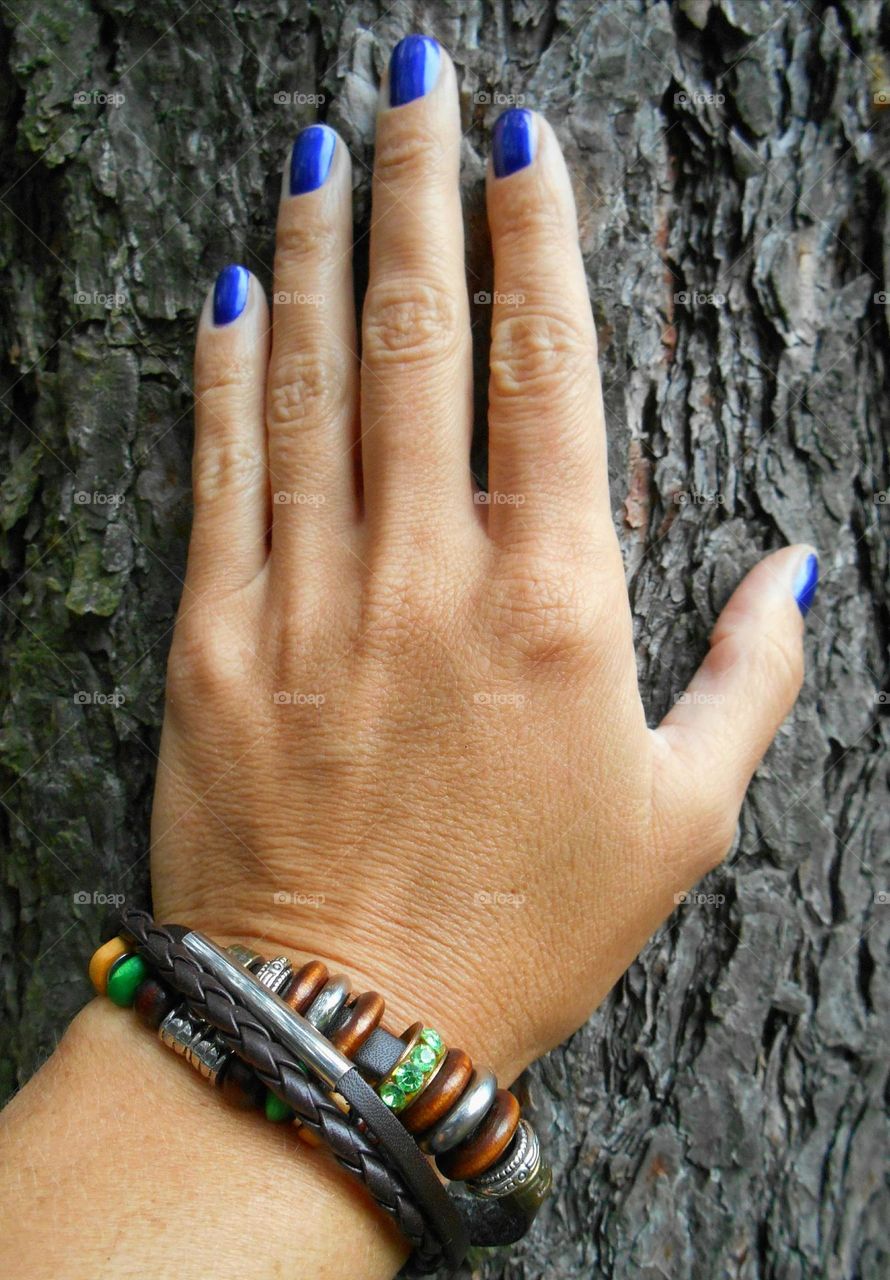 female hand with colour bracelet, beautiful accessories woman