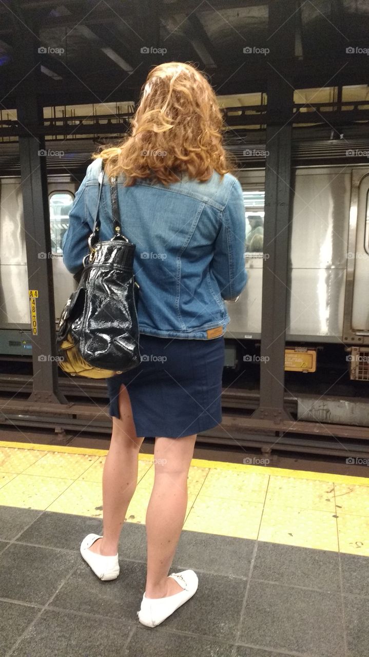 Girl on NYC Subway Platform