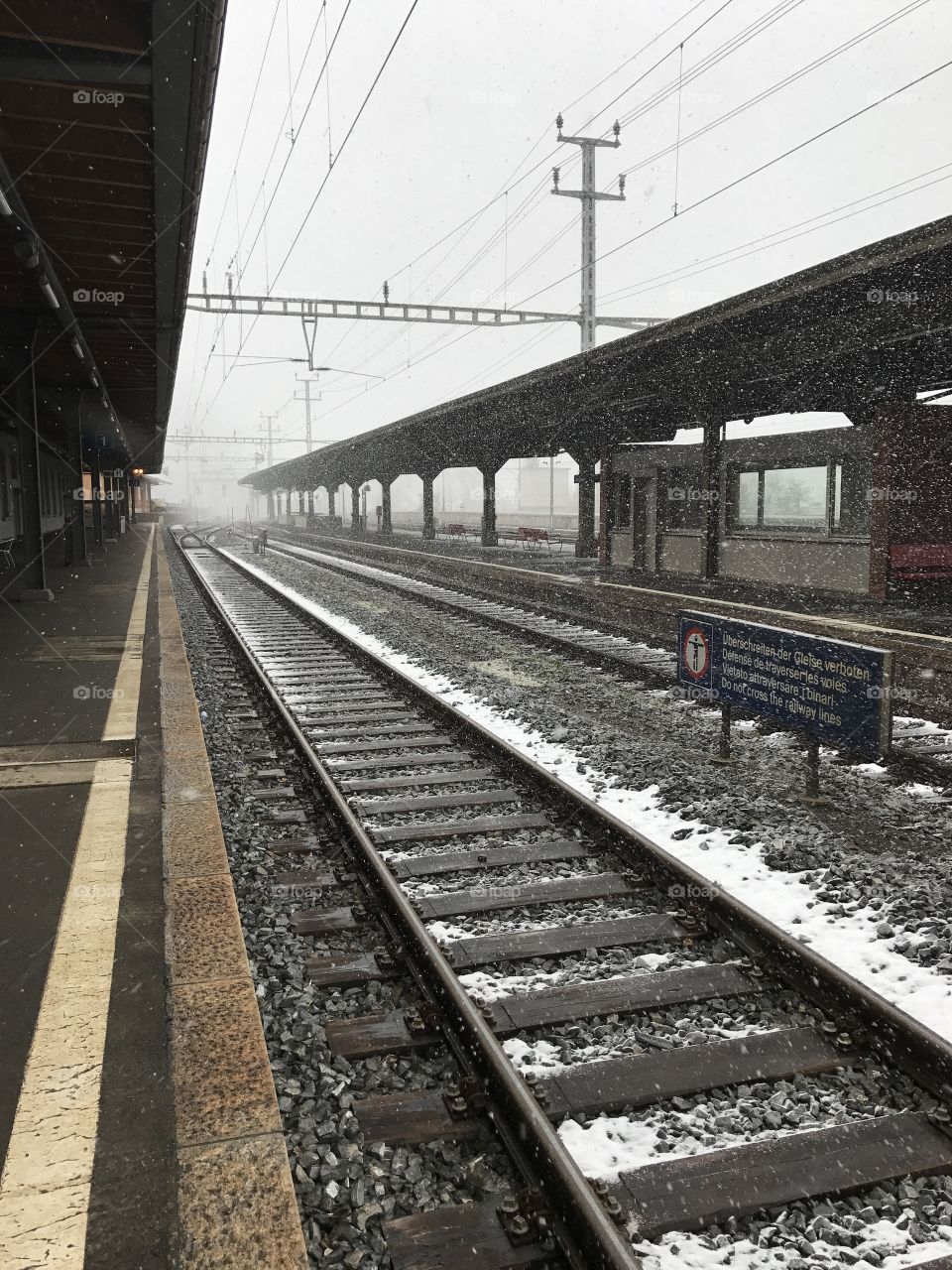 Snowy railroad tracks in Europe. 