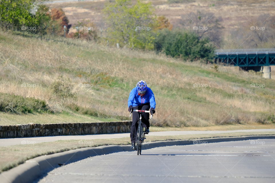 Cycling to the top of a steep hill