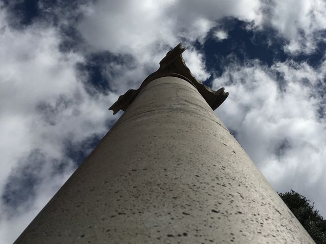A stone pillar reaching to support the sky. 