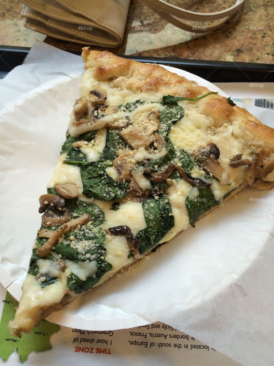 Well Dressed Slice. My favorite toppings of spinach and mushrooms on a thick slice of pizza. 