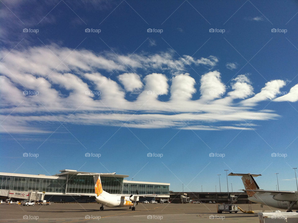 sunny clouds faces airport by paja