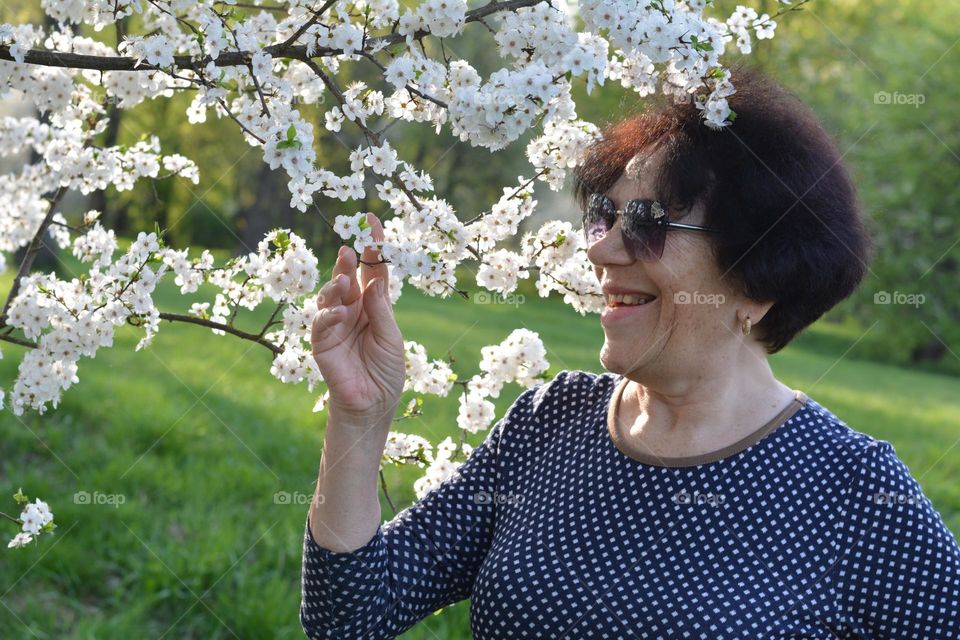 woman and blooming tree spring nature