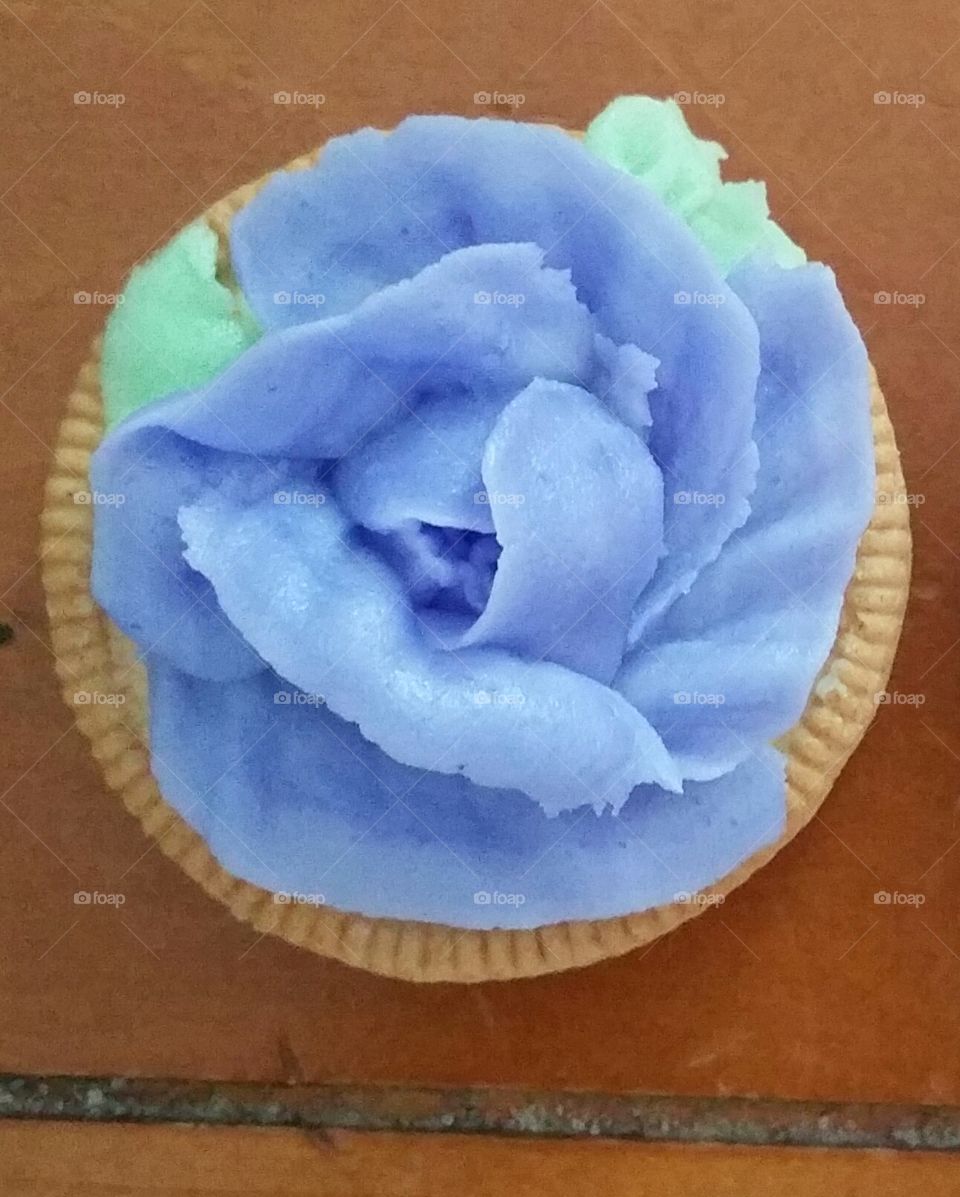 purple rose. was practicing making icing roses