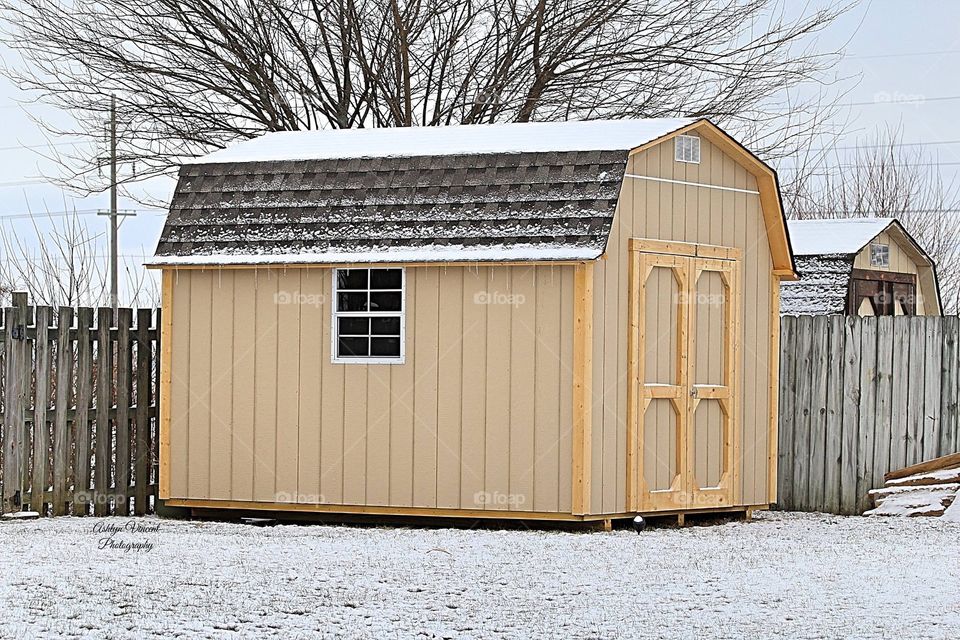 Snow on small barn