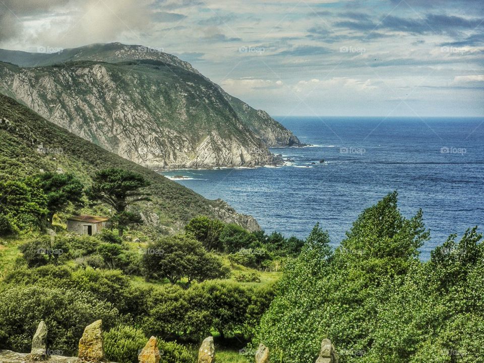 High angle view of cliff in sea