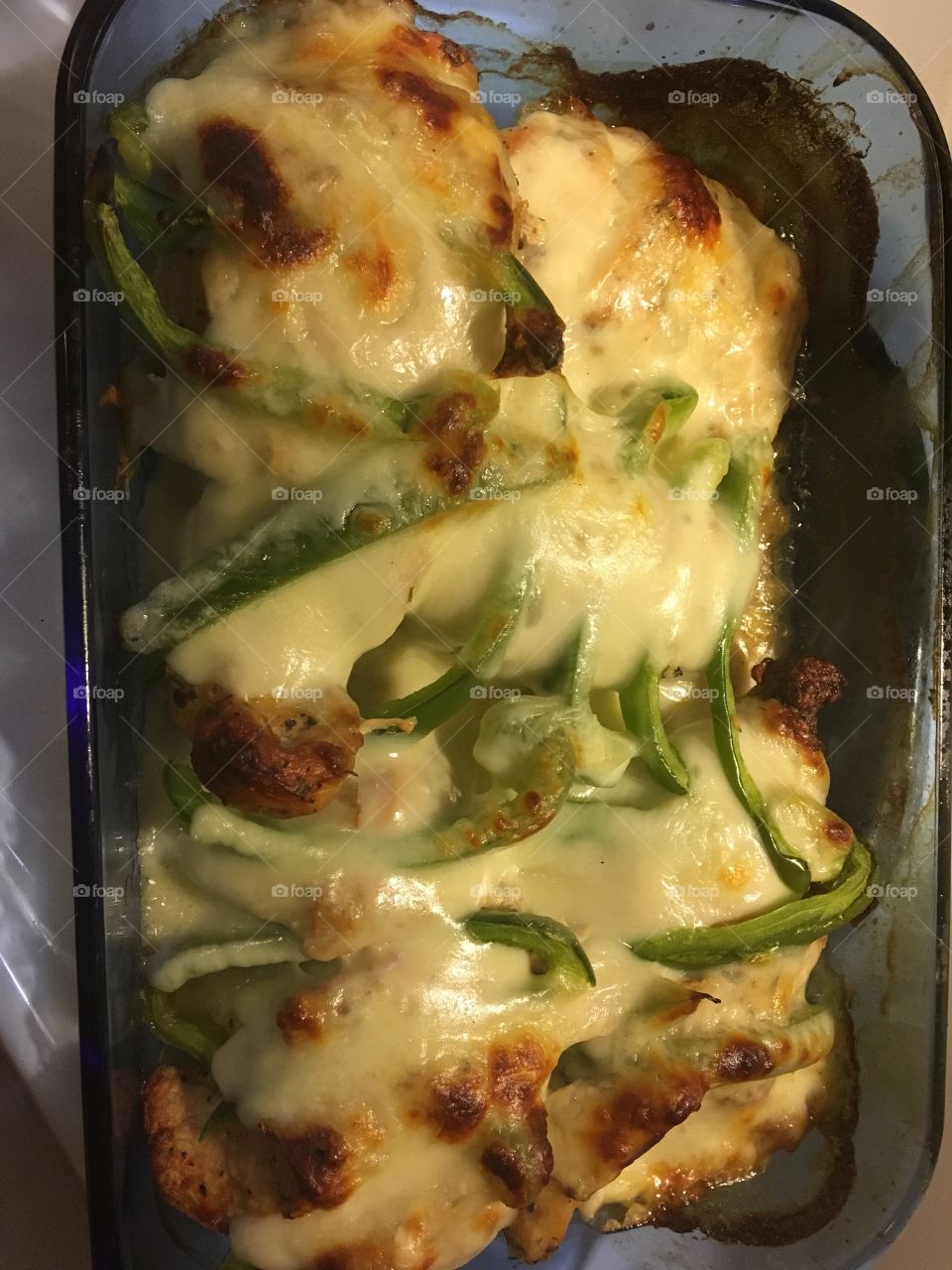 Hassleback chicken with onions, mozzarella and bell peppers 