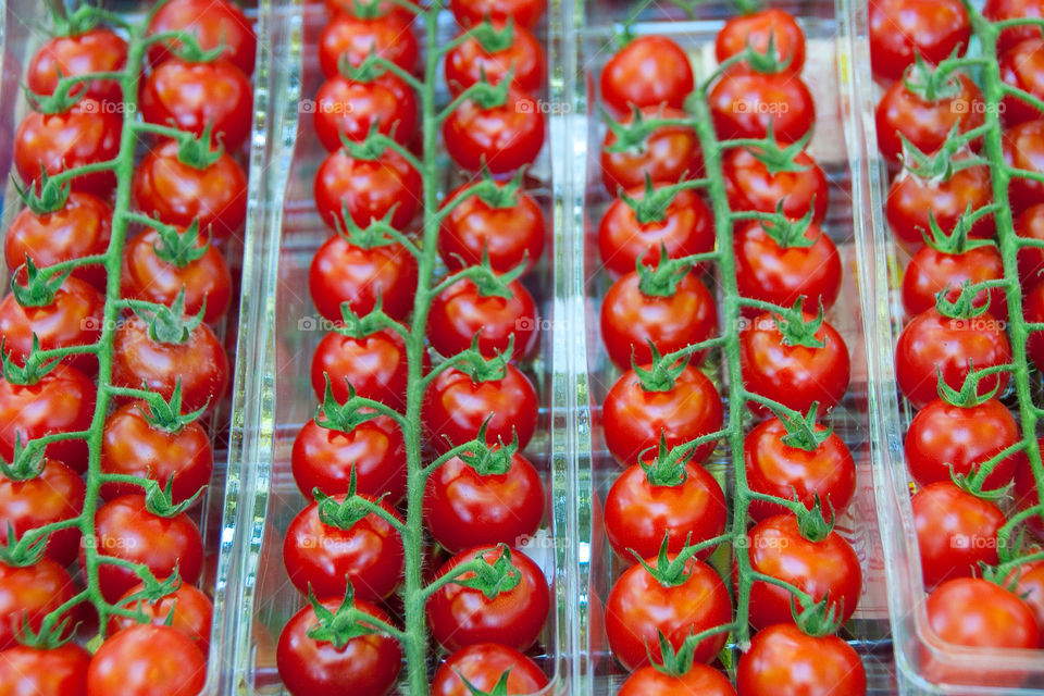 Cherry tomatoes on display at the farmers market in France