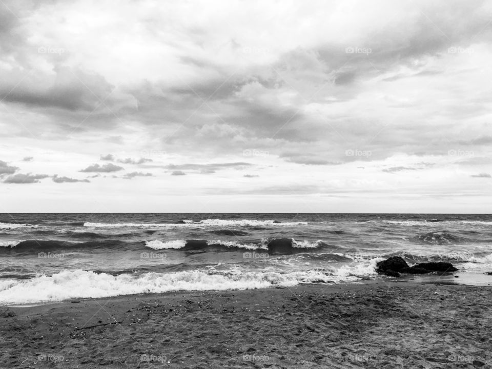 The Black Sea landscape. Odessa region. Seascape. The beautiful nature. Cloudy sky. Rainy beach. Summertime. Holidays. Seaside. 
