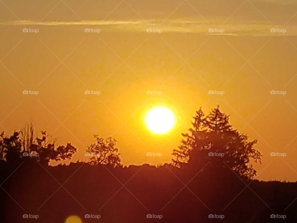 while we are out driving the back roads we love catching the sunsets on our way home.