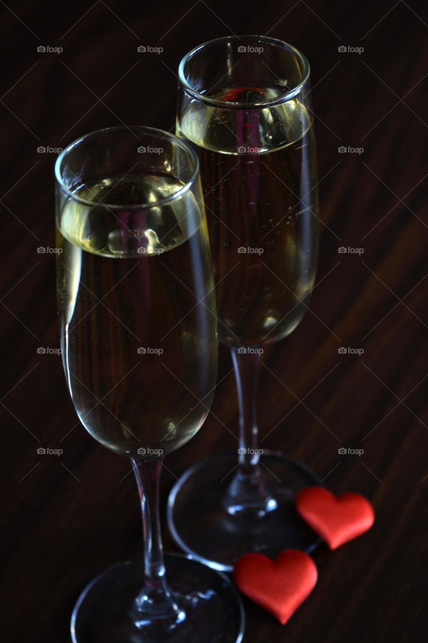 two champagne glasses night photography