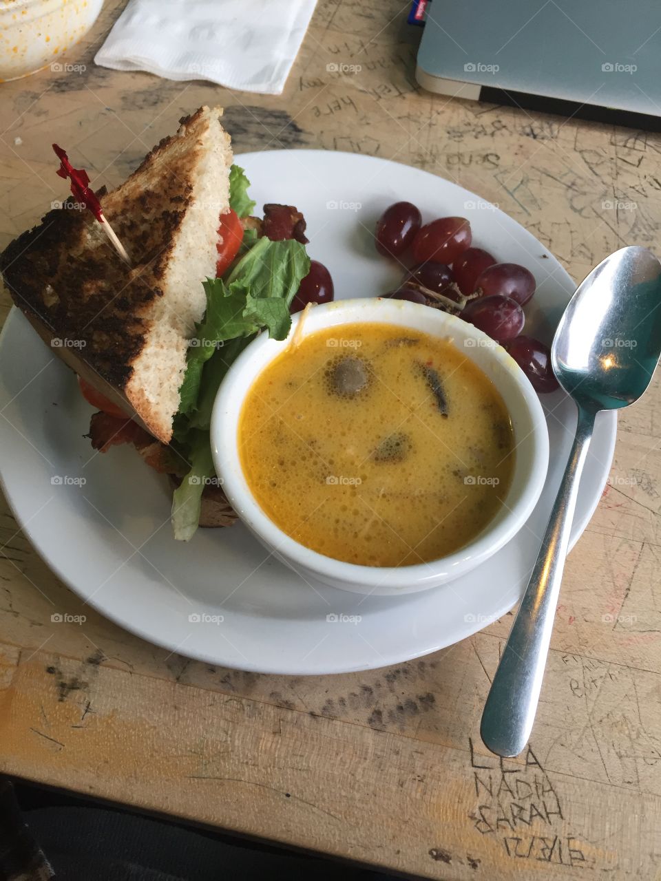 Avocado blt, chicken mushroom soup, and a hipster coffee shop table. 