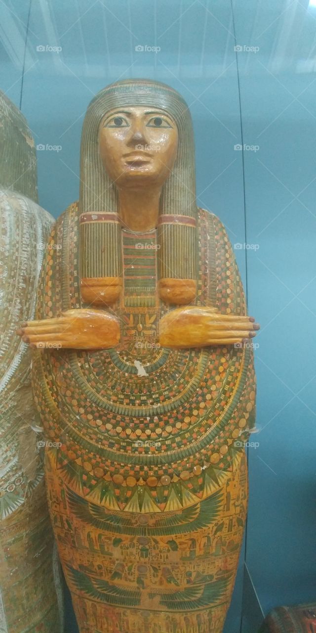 museum exhibit of Egyptian mummy case
