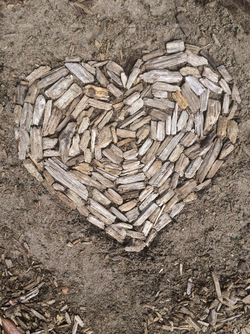 Michaelangelo have seen great heroes hidden in the white blocks of stone brought to him. A builder sees a magnificent house in the heap of materials on a construction site. What did you see in the wood chips scattered on a playground? A happy story, I hope. 