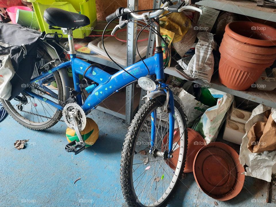 lonely bicycle in a shed