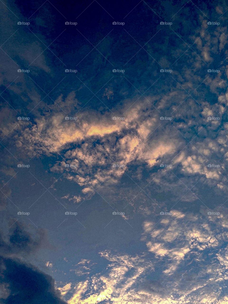 I want to show white clouds and blue sky in this photo.  The sky looks very beautiful with clouds and blue sky.