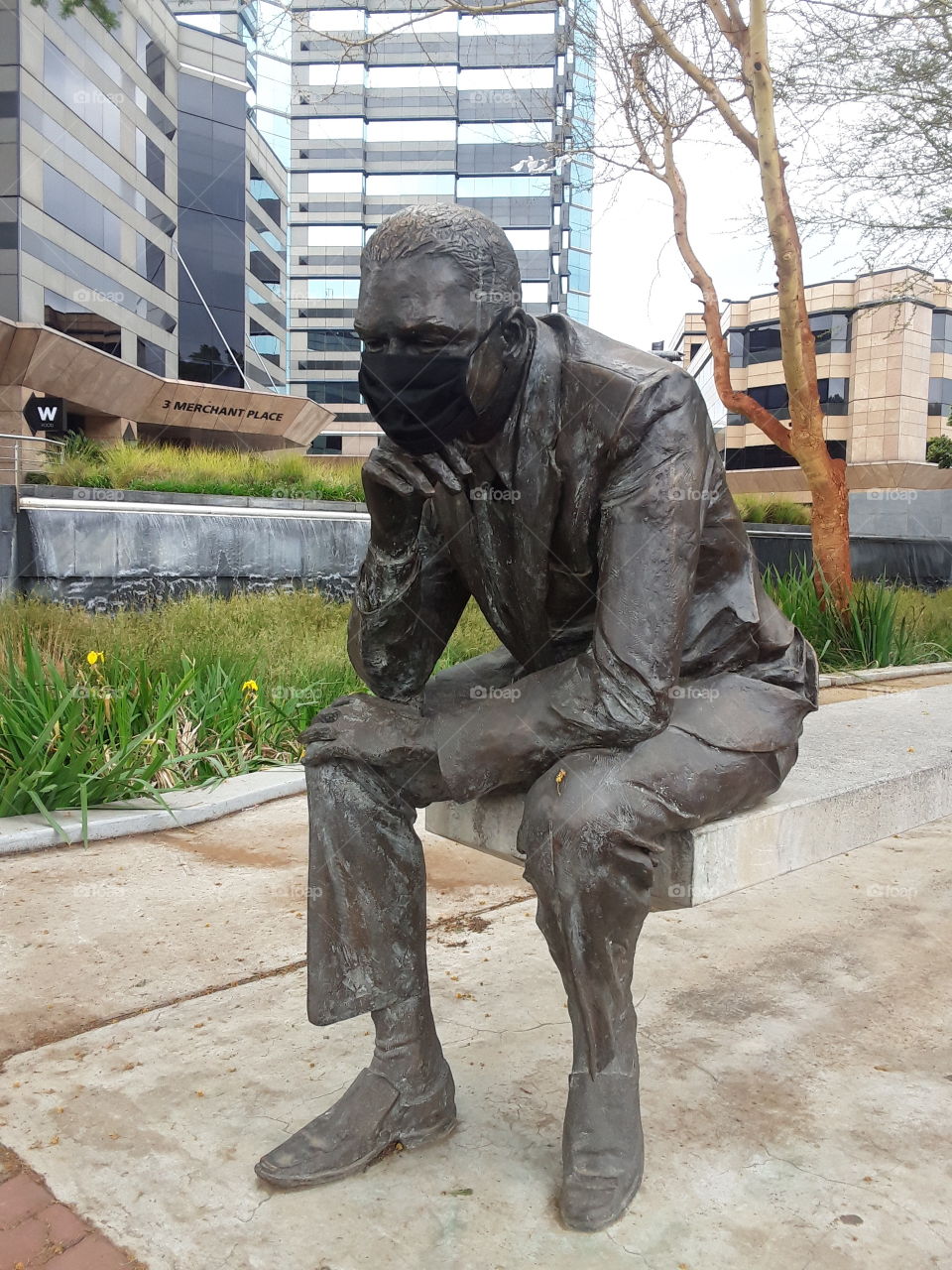 A man's sculpture at the street