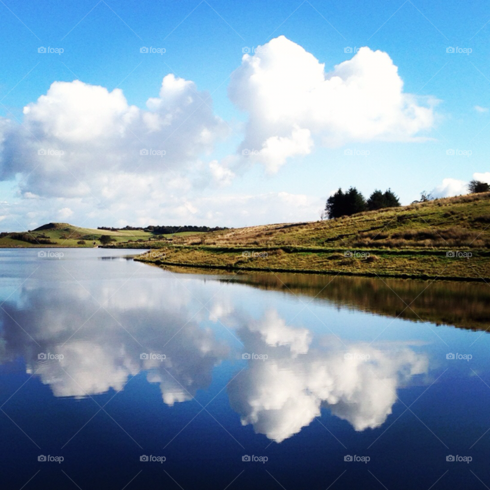 sky blue clouds water by trickysmith
