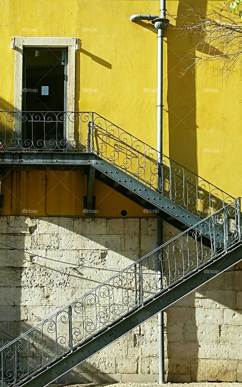 Metallic staircase towards house