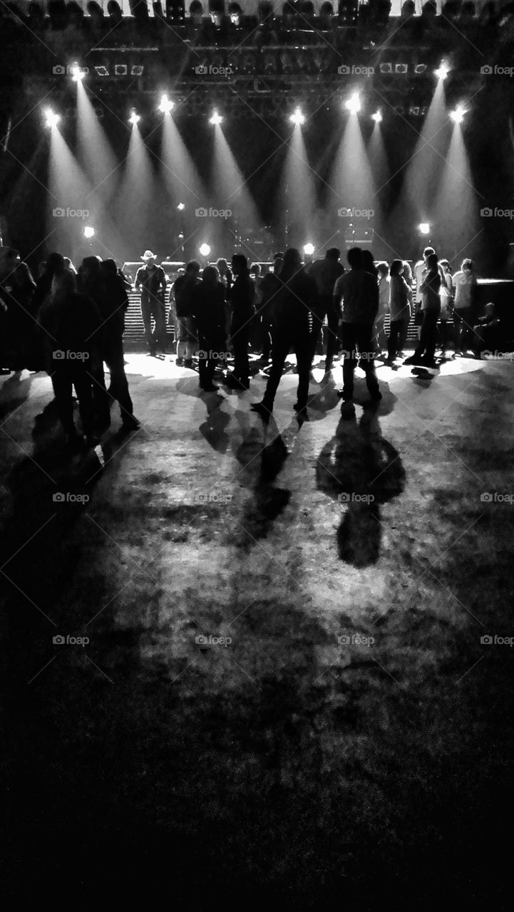 Fans in front of the stage. Crowd fans in front of the stage at the concert 