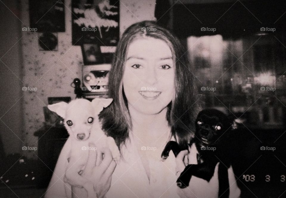 This is an old picture of me with 2 of my babies Sugar and Missy. I took the picture myself with a canon camera using black and white film.