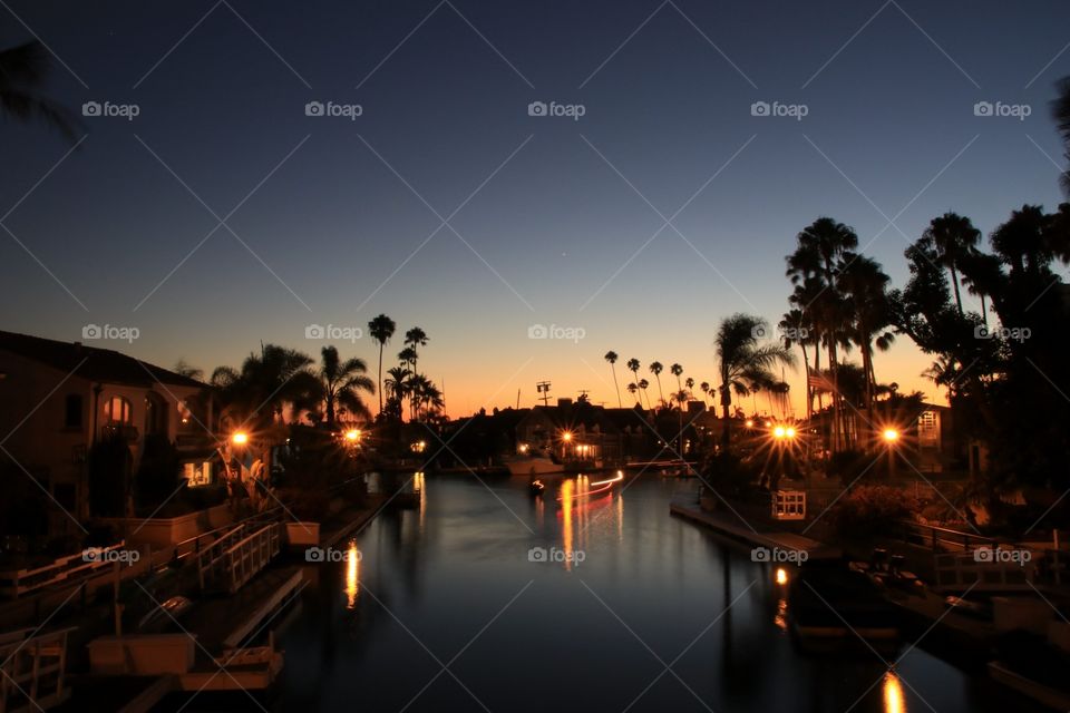 Gondolas and light trails on the water