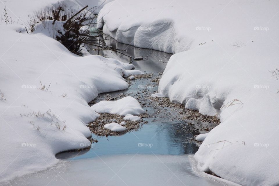 Snowy creek in winter