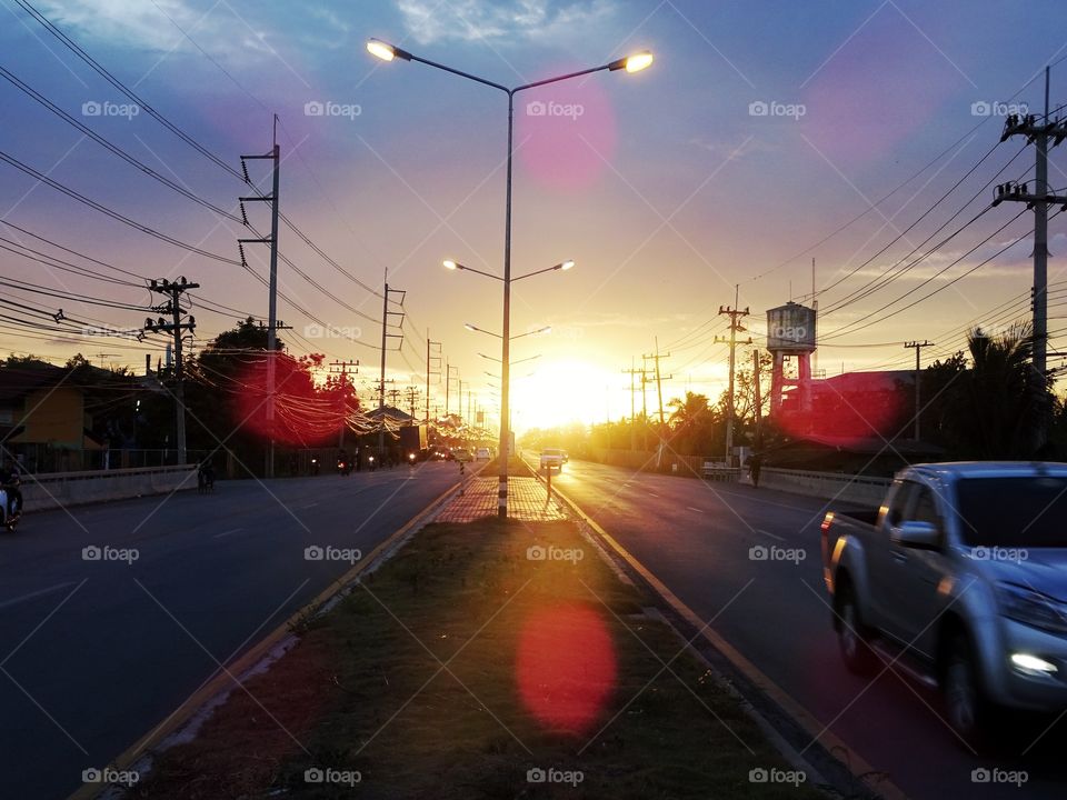 Sunset in the road