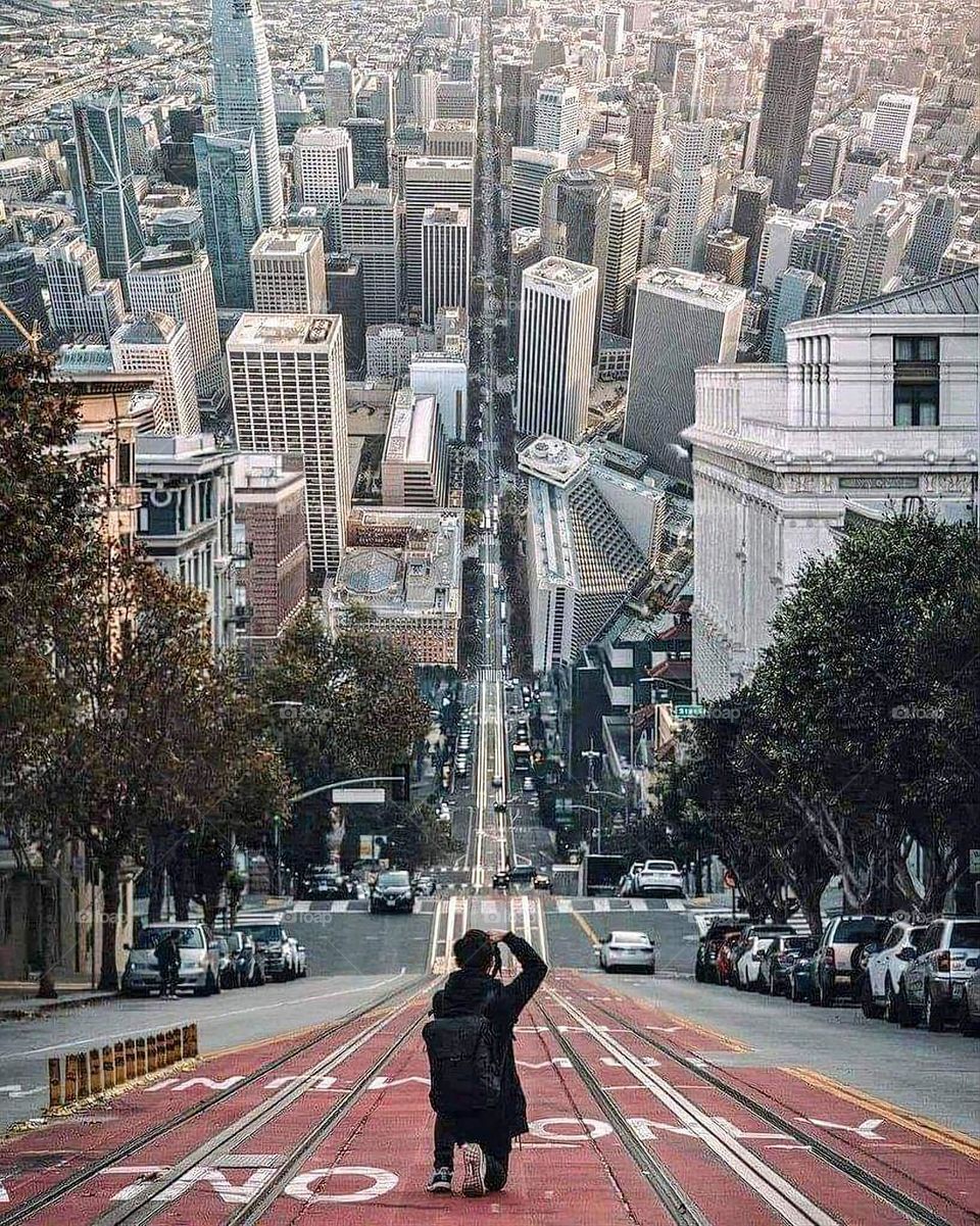 Glory be to God, and the wonderful picture. The picture of the road is beautiful with the very tall buildings. It is a wonderful picture and there is nothing more wonderful than it.
