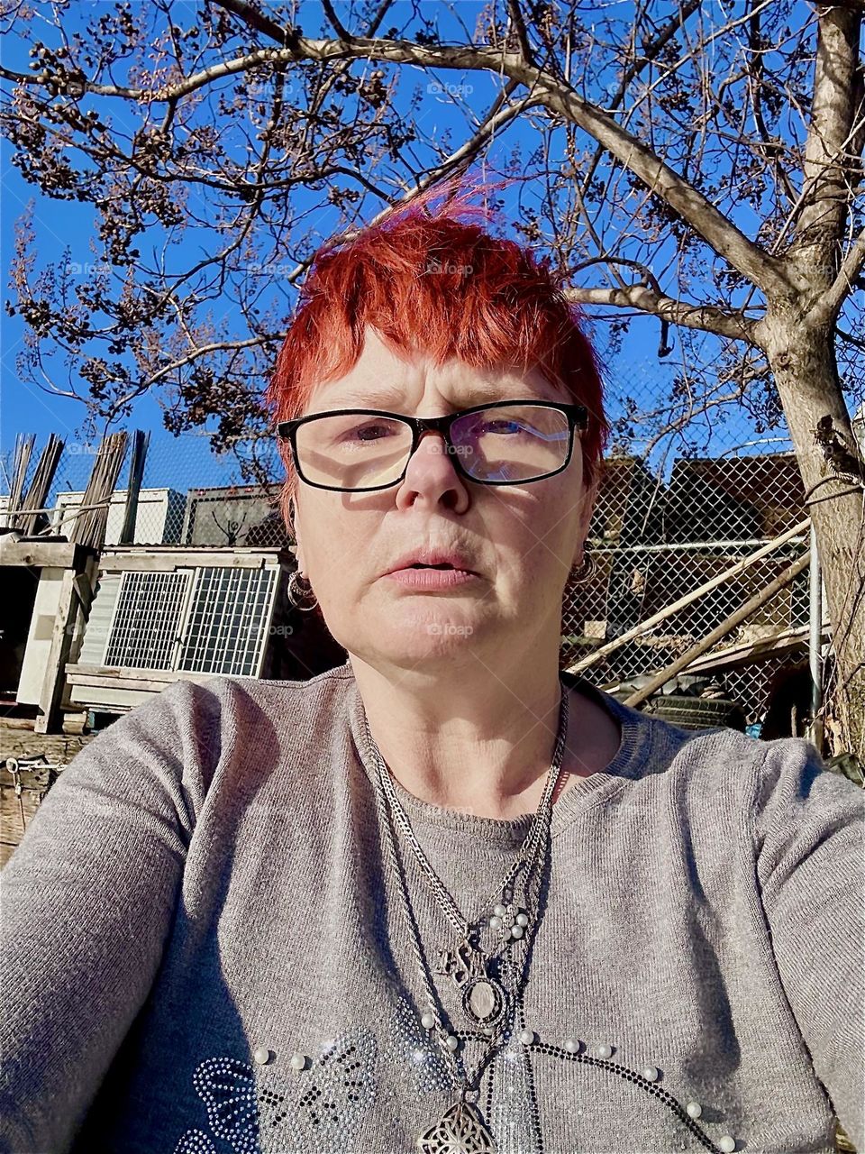 This is me, “Petra Schiller” a.k.a. “Maxine Firefox” aboard the “28 foot 1969 Luhrs” cabin cruiser that we, my partner “Timothy Trespas” and I have called home for quite a few years now. Living here is tight but it’s ours. 2023. Hypnotic Productions