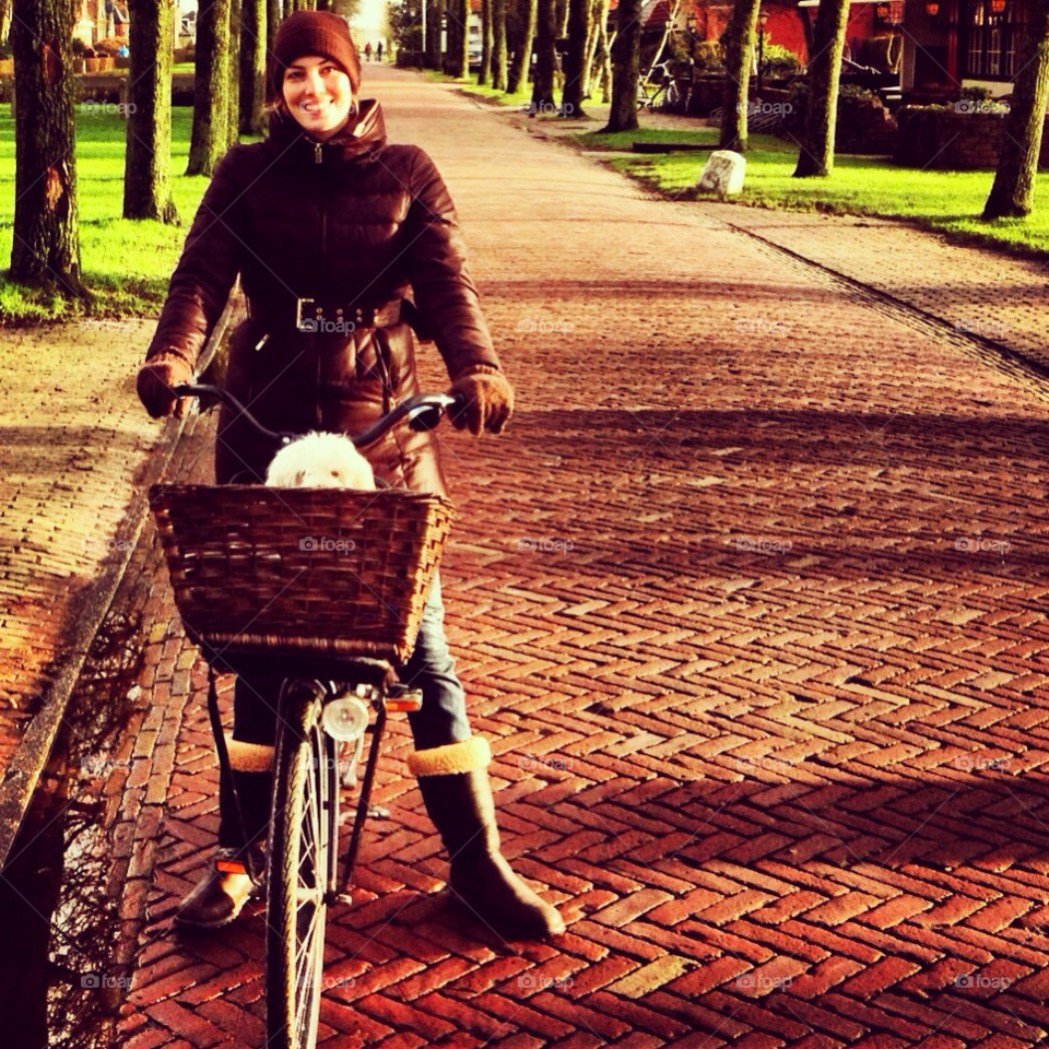 schiermonnikoog netherlands bicycle street woman by elpee