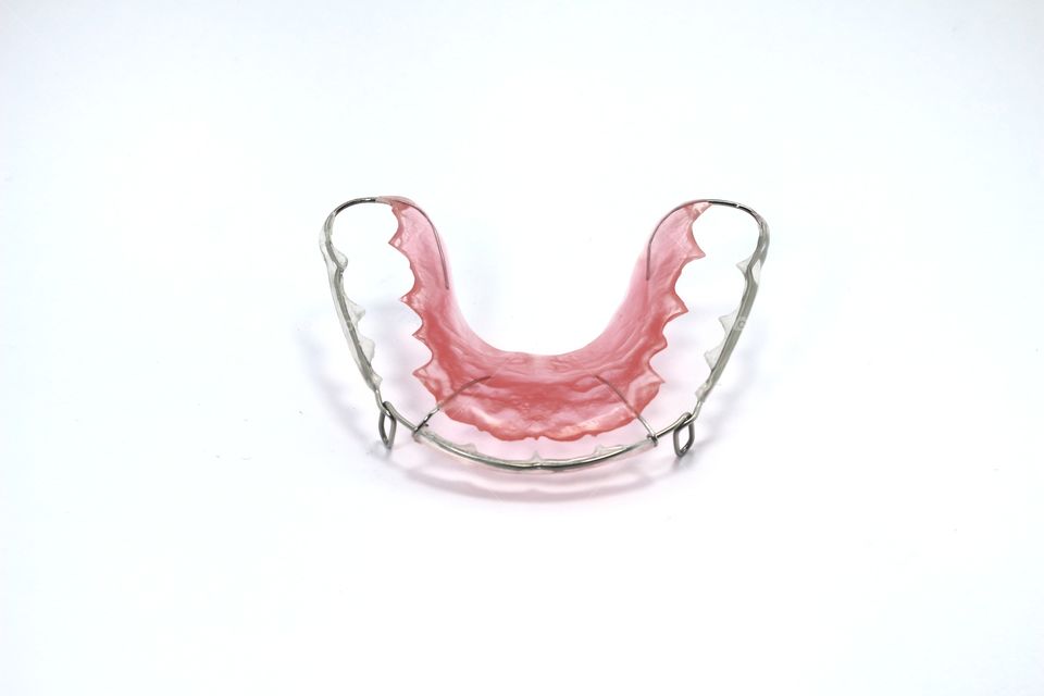 Pink Retainer on white background.