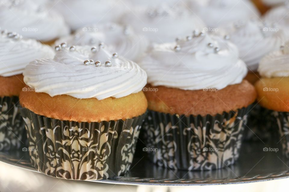 White frosted cupcakes