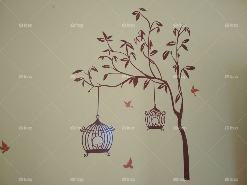 Tree wallpaper with bird cage