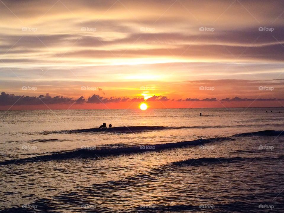 Swimmers in waves