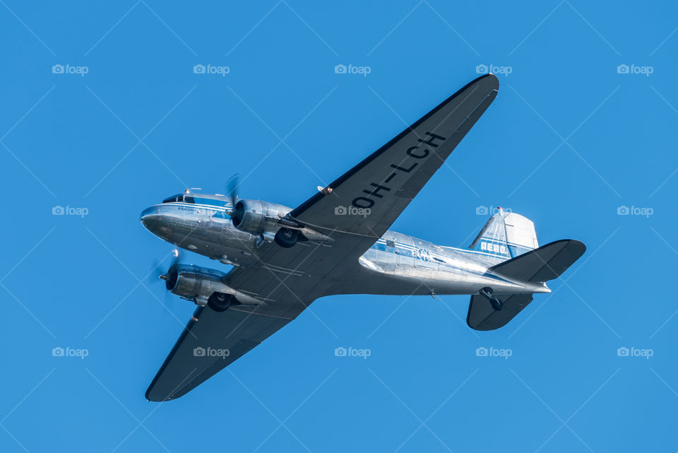 Helsinki, Finland - 9 June 2017: Historical Douglas DC-3 airliner performing in the  Kaivopuisto Air Show.  This aircraft two engine all metallic monoplane (OH-LCH) was purchased in 1947 by then Finnish airline company Aero. Aeroplane is now operated by civil avioation DC-association in Finland.